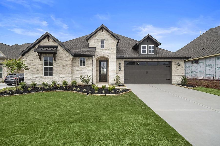 Representative exterior photo of a completed home built from the Sweet Clover by Caldwell Homes in Chambers Creek, Willis, TX (Image 2). Representative exterior photo of a completed home built from the Sweet Clover by Caldwell Homes in Chambers Creek, Willis, TX (Image 2).
