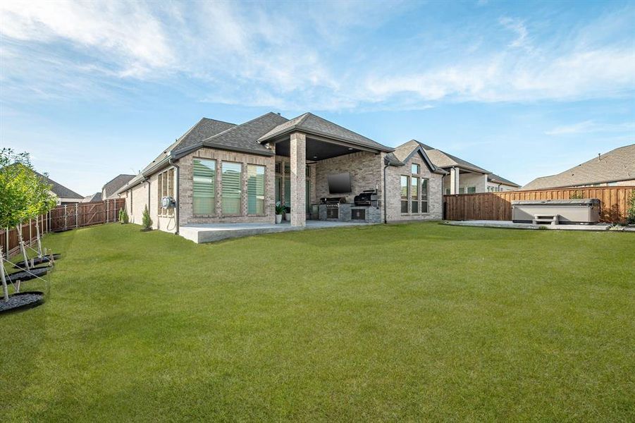 Exterior details and patio area of a home in Trinity Falls, McKinney (Image 28).