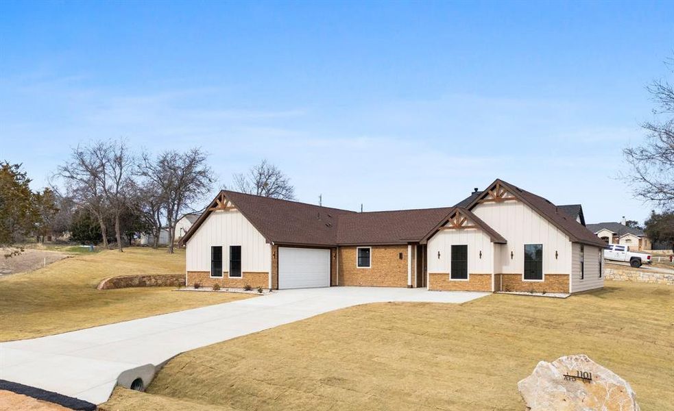 Front exterior of a new home in , Granbury, TX, highlighting curb appeal (Image 16). Front exterior of a new home in , Granbury, TX, highlighting curb appeal (Image 16).