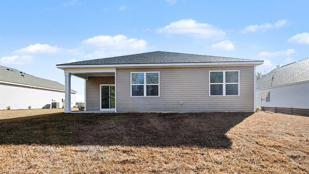 Exterior details and patio area of a home in Pinewood Estates, Conway (Image 3).