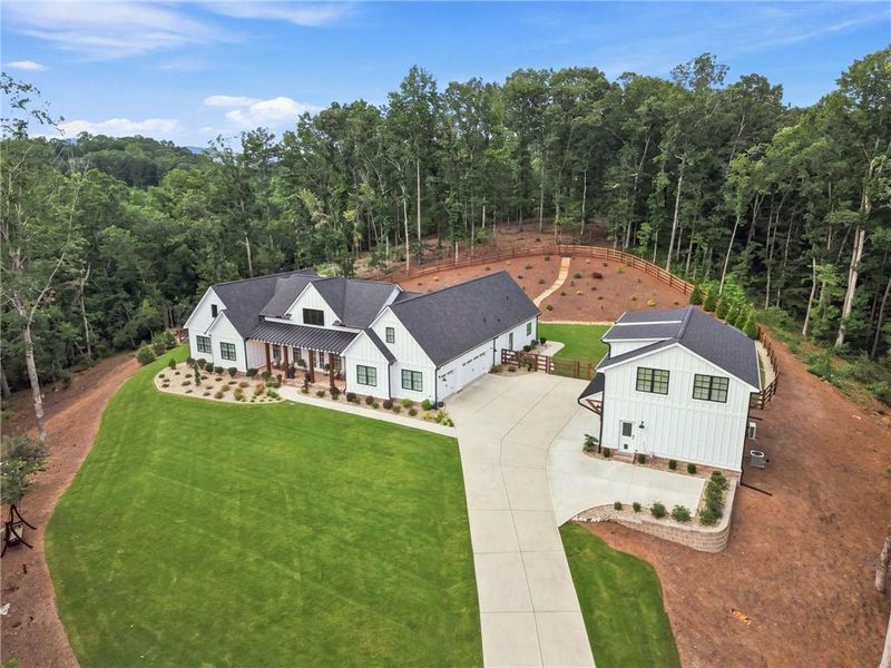 Front exterior of a new home in , Ball Ground, GA, highlighting curb appeal (Image 23). Front exterior of a new home in , Ball Ground, GA, highlighting curb appeal (Image 23).