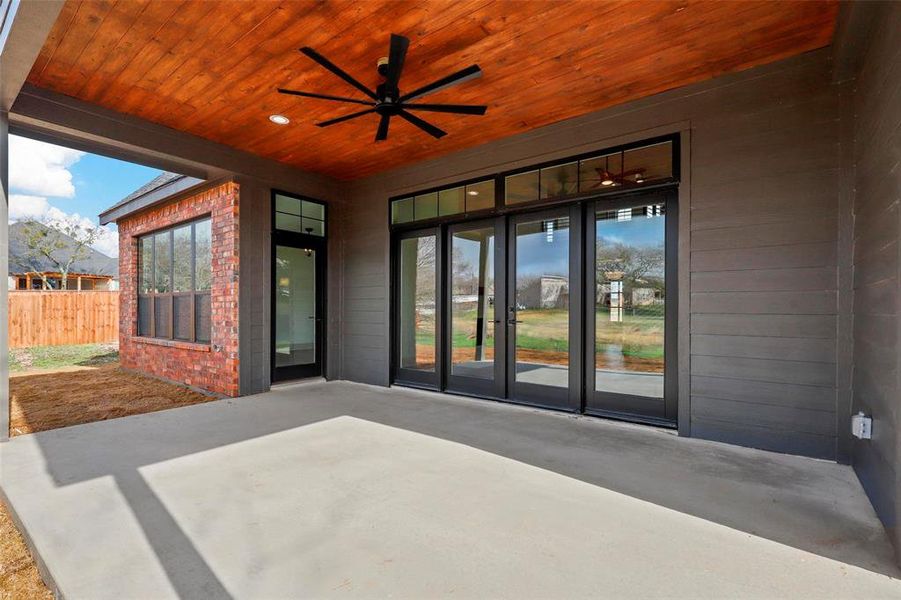 View of patio / terrace featuring french doors and ceiling fan