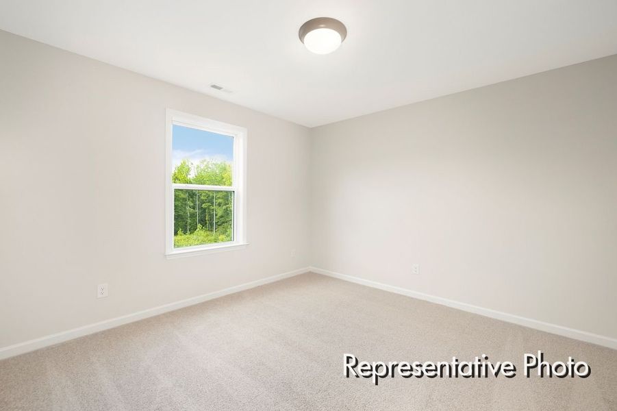 Spacious, unfurnished interior of a new home in Lake Royale, Louisburg (Image 20).