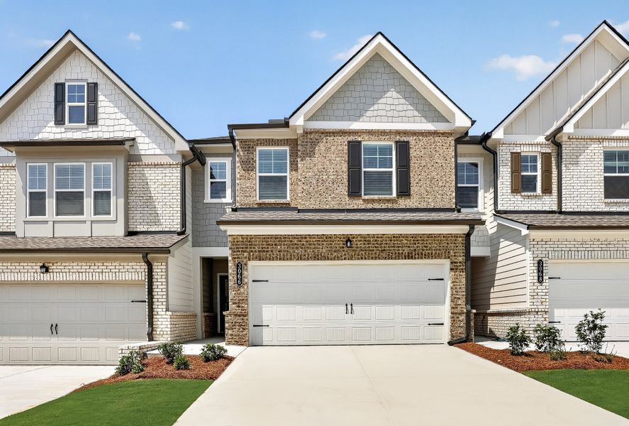 Front exterior of a new home in Towns at Ivy Creek, Buford, GA, highlighting curb appeal (Image 1). Front exterior of a new home in Towns at Ivy Creek, Buford, GA, highlighting curb appeal (Image 1).