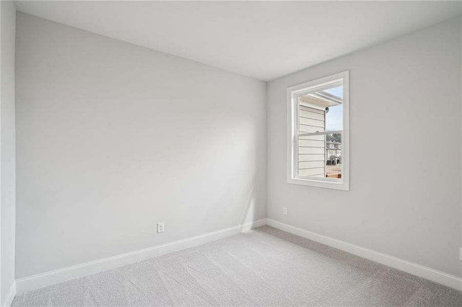 Spacious, unfurnished interior of a new home in Ward's Crossing Townhomes, Johns Creek (Image 21).