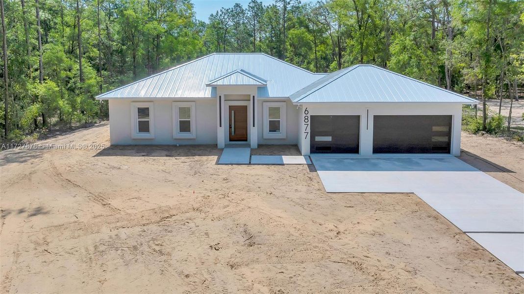 HYDRO-SEEDING LAWN AND IRRIGATION SYSTEM IN PLACE