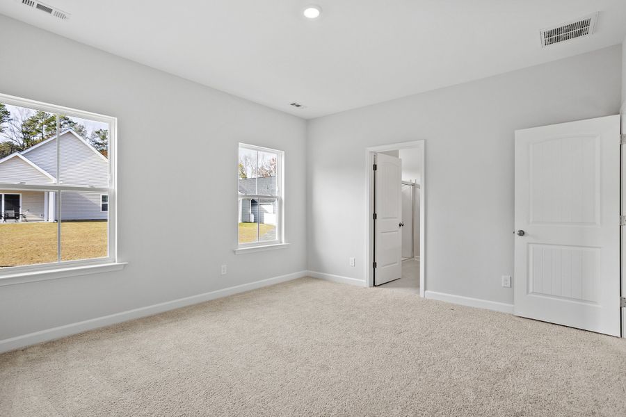 Spacious, unfurnished interior of a new home in Renaissance at White Oak, Garner (Image 22).