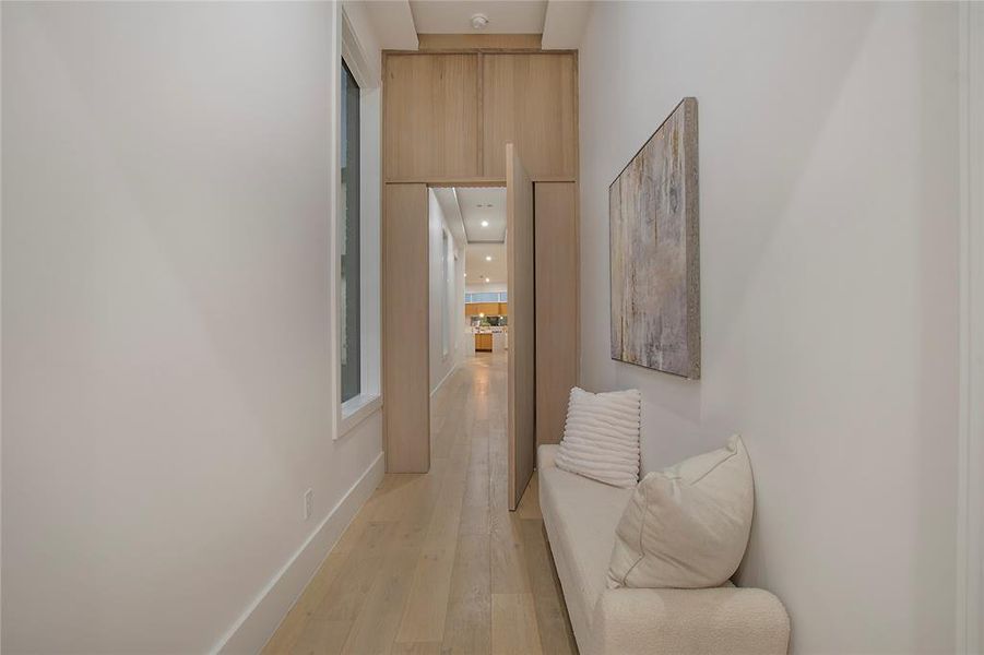 Hallway featuring light hardwood / wood-style floors