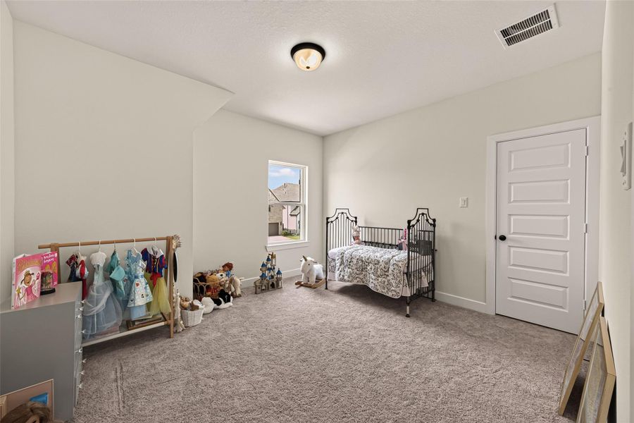 This additional upstairs living space offers endless possibilities for a playroom or lounge area. This additional upstairs living space offers endless possibilities for a playroom or lounge area.