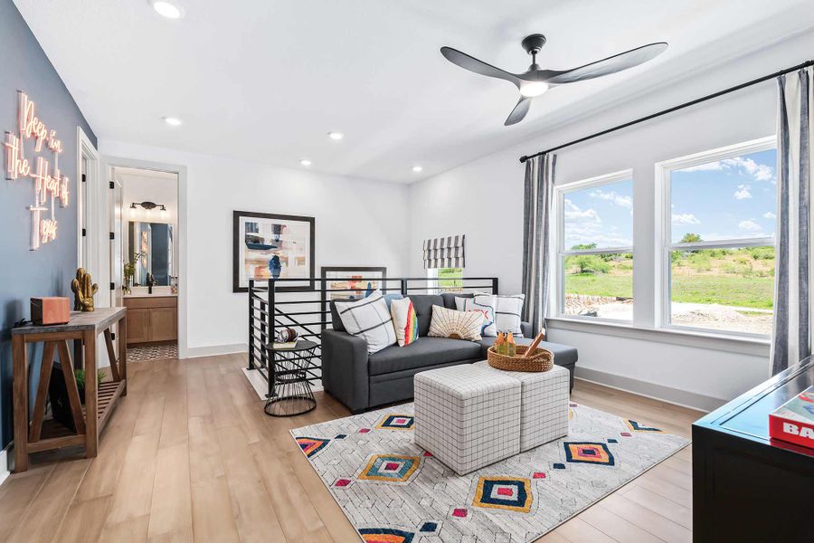 Representative furnished interior of a home built from the The Settler by David Weekley Homes in Goodnight Ranch, Austin (Image 6).