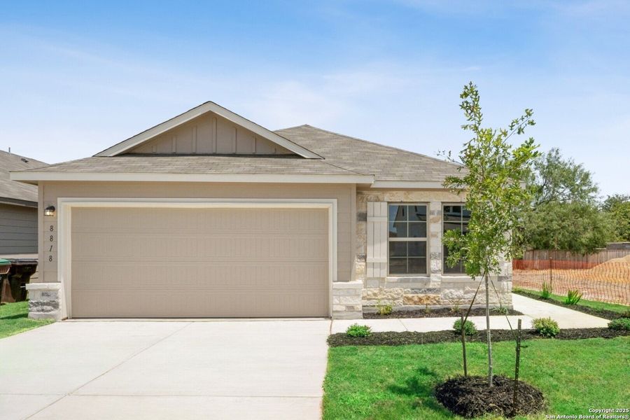 Front exterior of a new home in Cinco Lakes, San Antonio, TX, highlighting curb appeal (Image 11). Front exterior of a new home in Cinco Lakes, San Antonio, TX, highlighting curb appeal (Image 11).