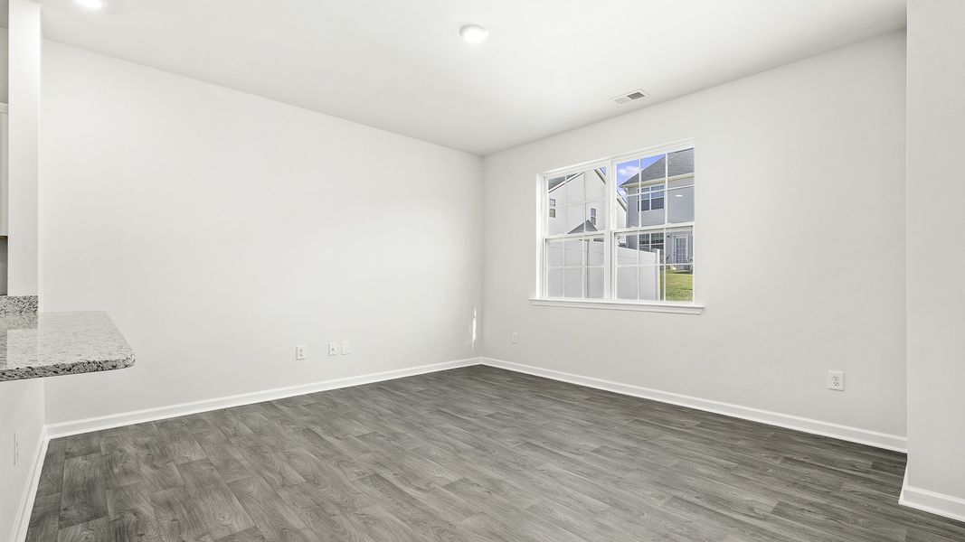 Spacious, unfurnished interior of a new home in North Village Townes, Greensboro (Image 7).