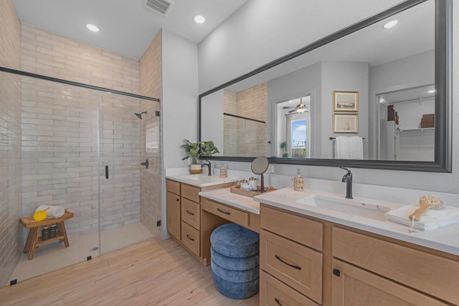 Representative furnished interior of a home built from the Hampton by Chesmar Homes in Meridiana 50's and 60's, Manvel (Image 51).