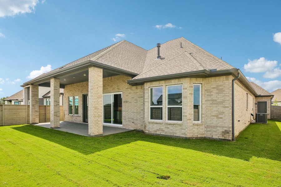 Exterior details and patio area of a home in Legacy, Friendswood (Image 21).