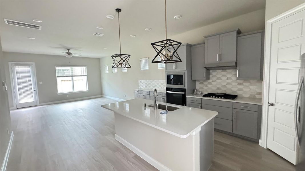 Furnished interior view inside a new home in Dunvale Village - Patio Home Collection, Houston (Image 8). Furnished interior view inside a new home in Dunvale Village - Patio Home Collection, Houston (Image 8).