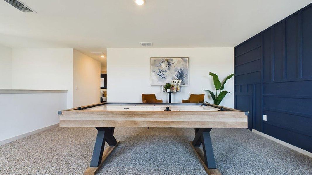 Representative furnished interior of a home built from the The Pierce by D.R. Horton in Overlook West, Wolfforth (Image 18).