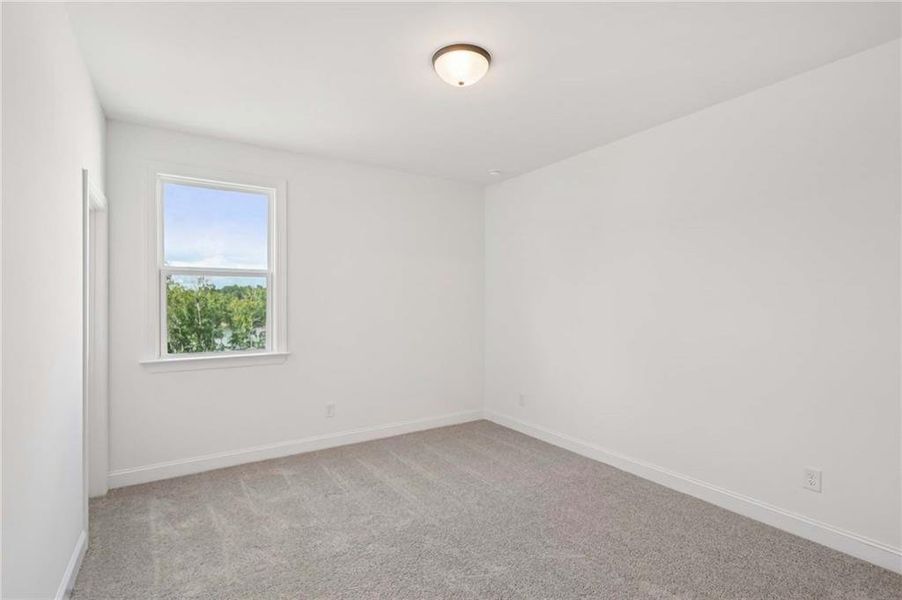Spacious, unfurnished interior of a new home in East Harbor II at Chestatee, Dawsonville (Image 26).