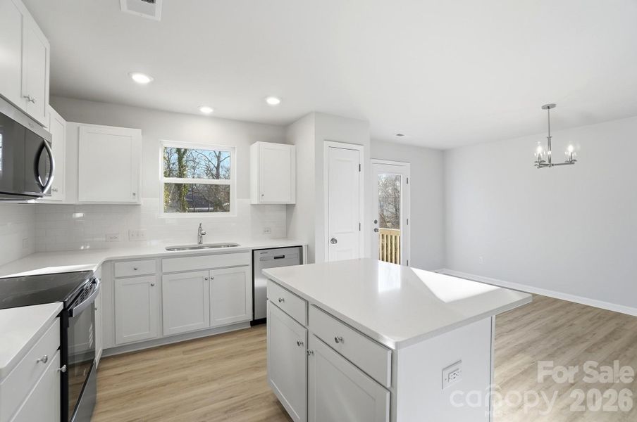 Furnished interior view inside a new home in , Statesville (Image 8).