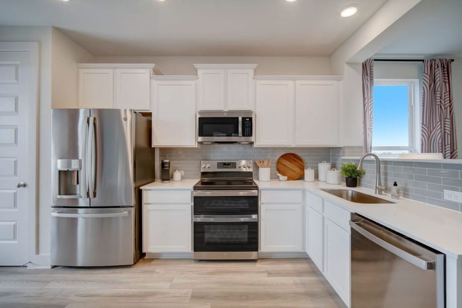 Furnished interior view inside a new home in Avery Centre, Round Rock (Image 8).