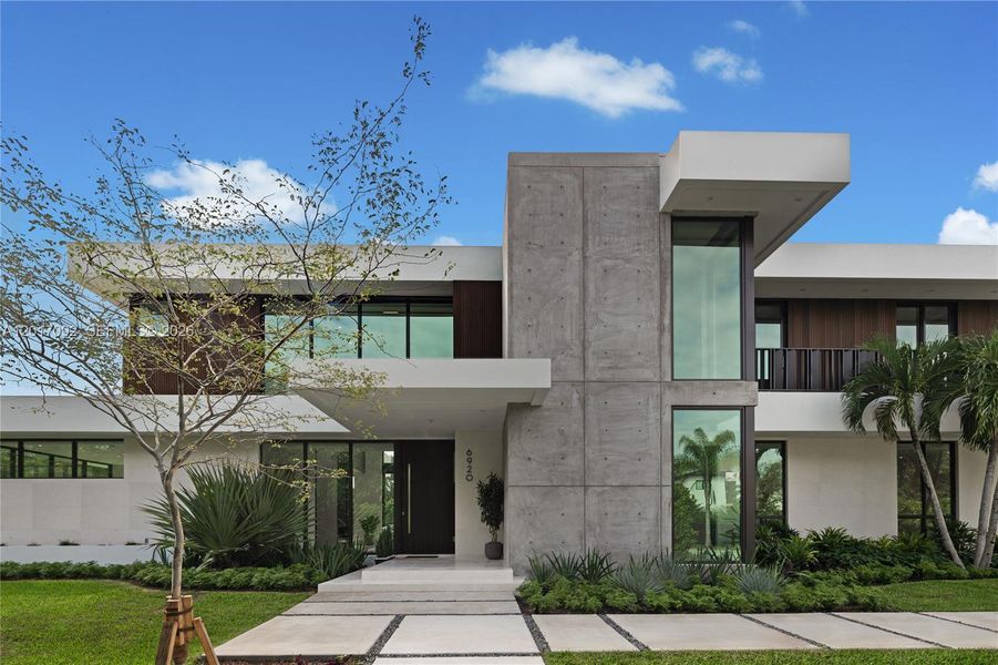 Front exterior of a new home in , Pinecrest, FL, highlighting curb appeal (Image 1). Front exterior of a new home in , Pinecrest, FL, highlighting curb appeal (Image 1).