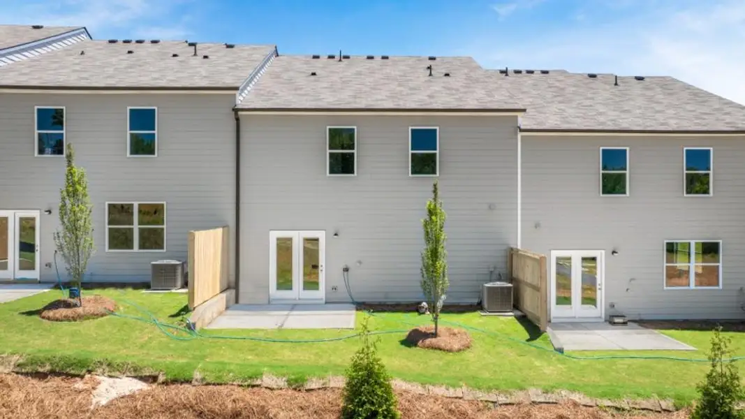 Exterior details and patio area of a home in Village at Pine Valley, Gainesville (Image 4).