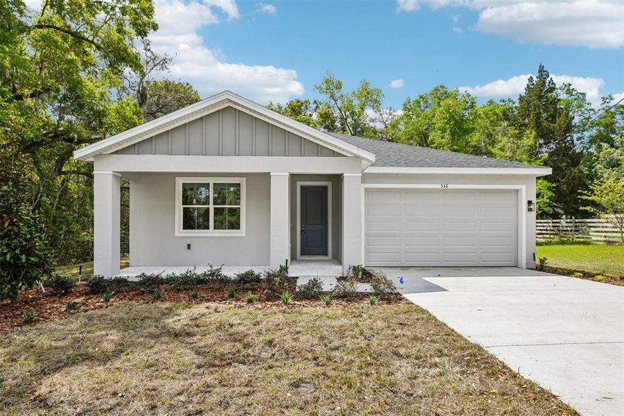 Front exterior of a new home in , Deland, FL, highlighting curb appeal (Image 17).