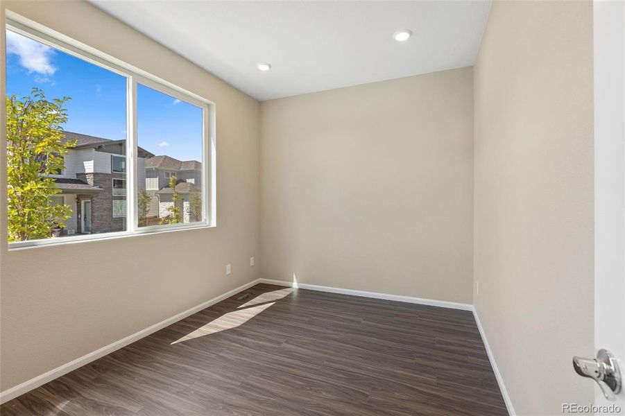 Spacious, unfurnished interior of a new home in Woodrose at Painted Prairie, Aurora (Image 25).