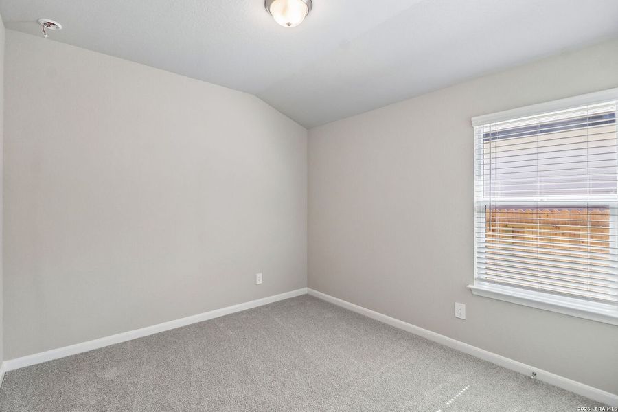 Spacious, unfurnished interior of a new home in Estancia Ranch - Premier Series, San Antonio (Image 36).