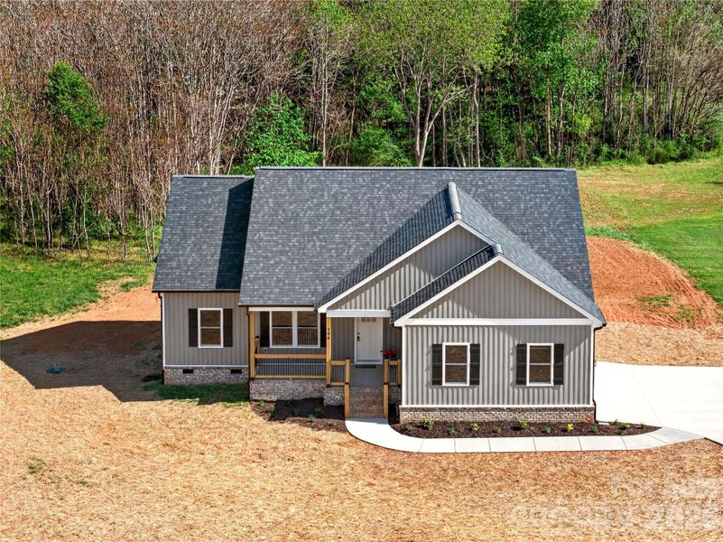 Front exterior of a new home in , Harmony, NC, highlighting curb appeal (Image 24). Front exterior of a new home in , Harmony, NC, highlighting curb appeal (Image 24).