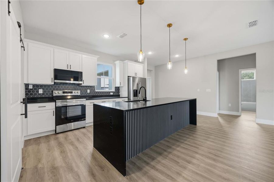 Furnished interior view inside a new home in , Winter Haven (Image 9).