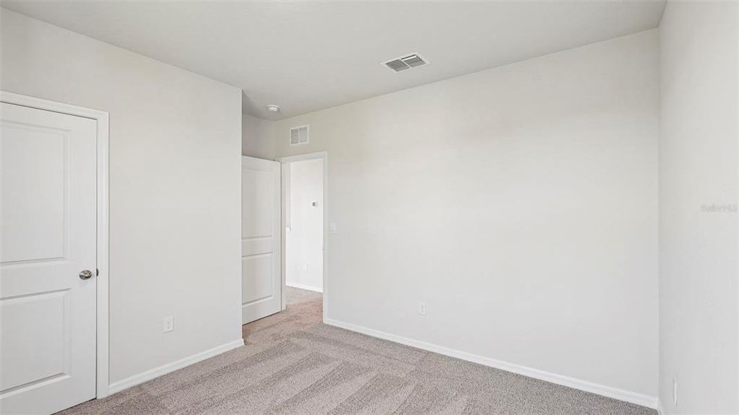 Spacious, unfurnished interior of a new home in Bella Lago, Parrish (Image 27).