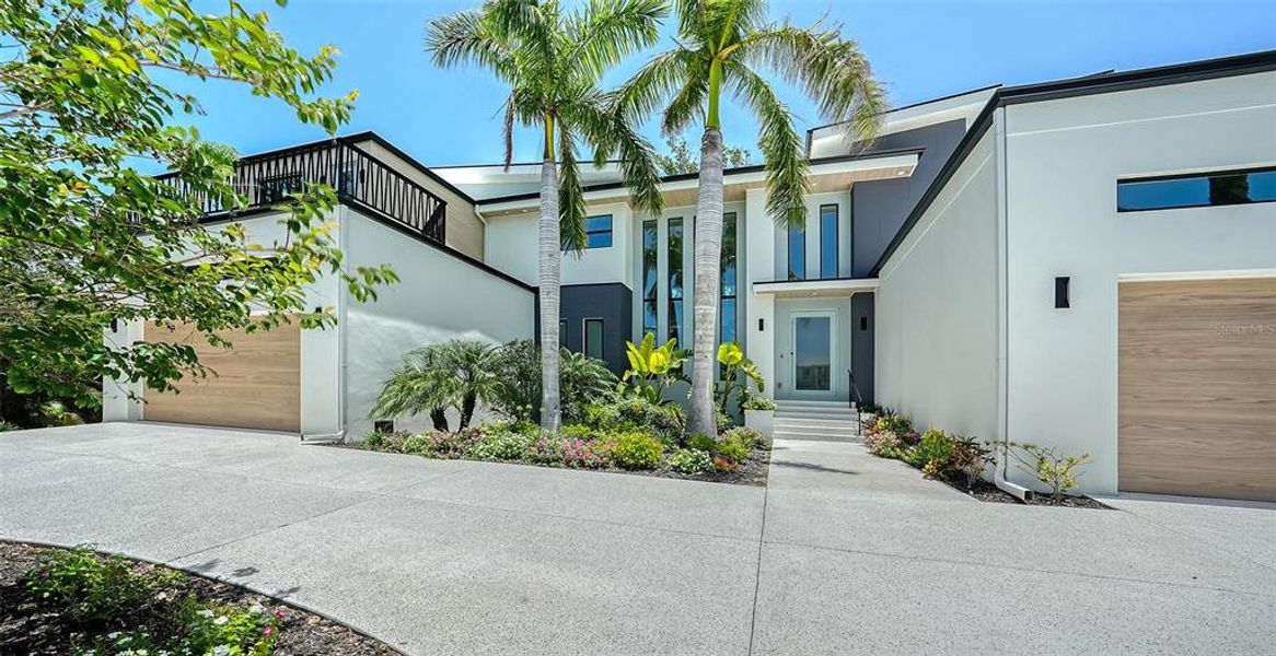 Front exterior of a new home in , Sarasota, FL, highlighting curb appeal (Image 28).