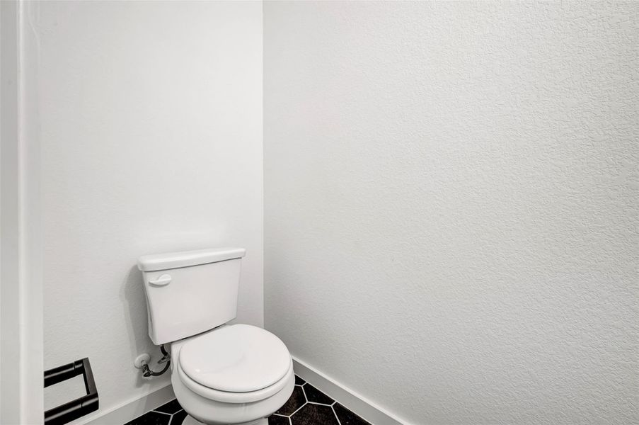 Furnished interior view inside a new home in Heritage, Dripping Springs (Image 11).