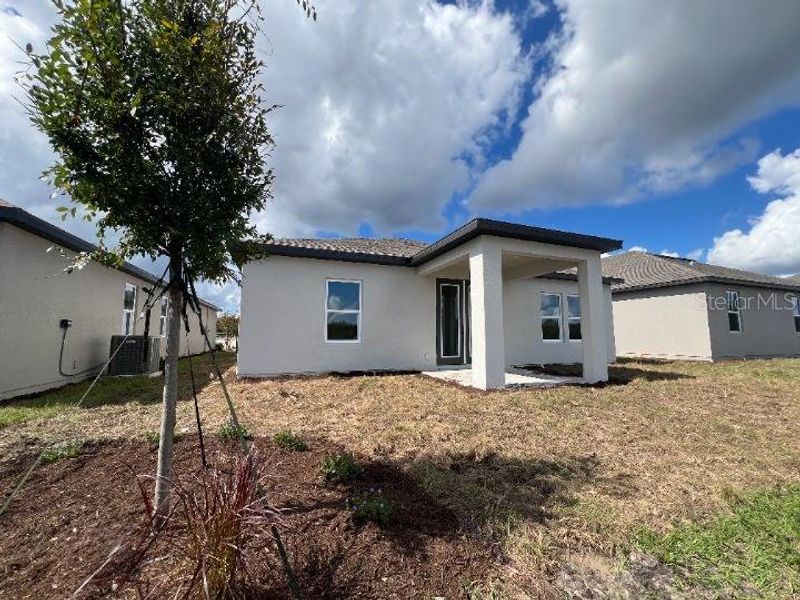 Exterior details and patio area of a home in Hawks Run, Kissimmee (Image 3). Exterior details and patio area of a home in Hawks Run, Kissimmee (Image 3).