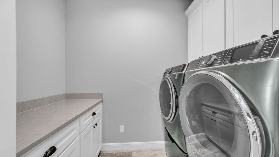 Furnished interior in a model home at Saddle Crest Estates in Weatherford (Image 7).