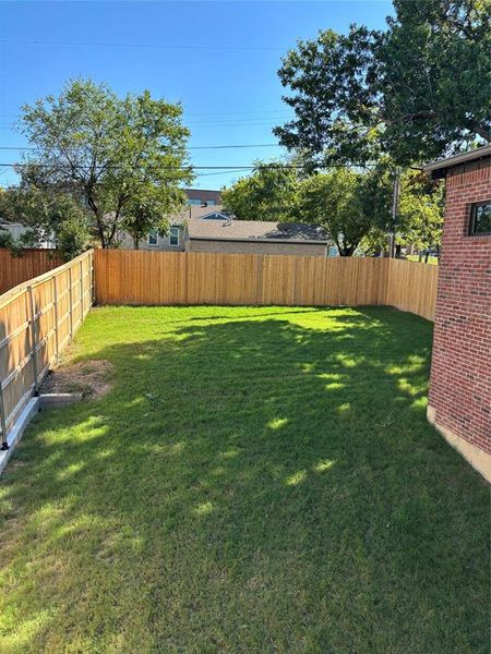 View of fenced backyard large enough for a pool