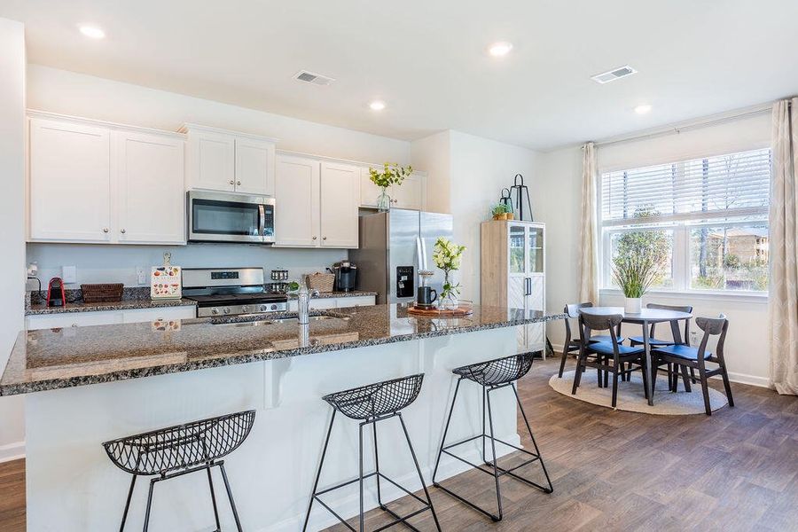 Furnished interior view inside a new home in Pine Hills at Cane Bay, Summerville (Image 21).