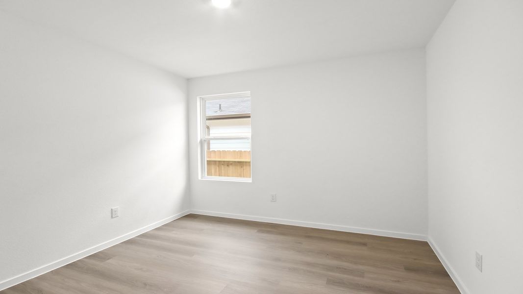 Spacious, unfurnished interior of a new home in Harrington Trails at The Canopies, Splendora (Image 19).
