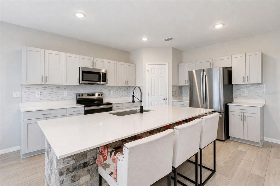 Furnished interior view inside a new home in Pasadena Point, Wesley Chapel (Image 9).