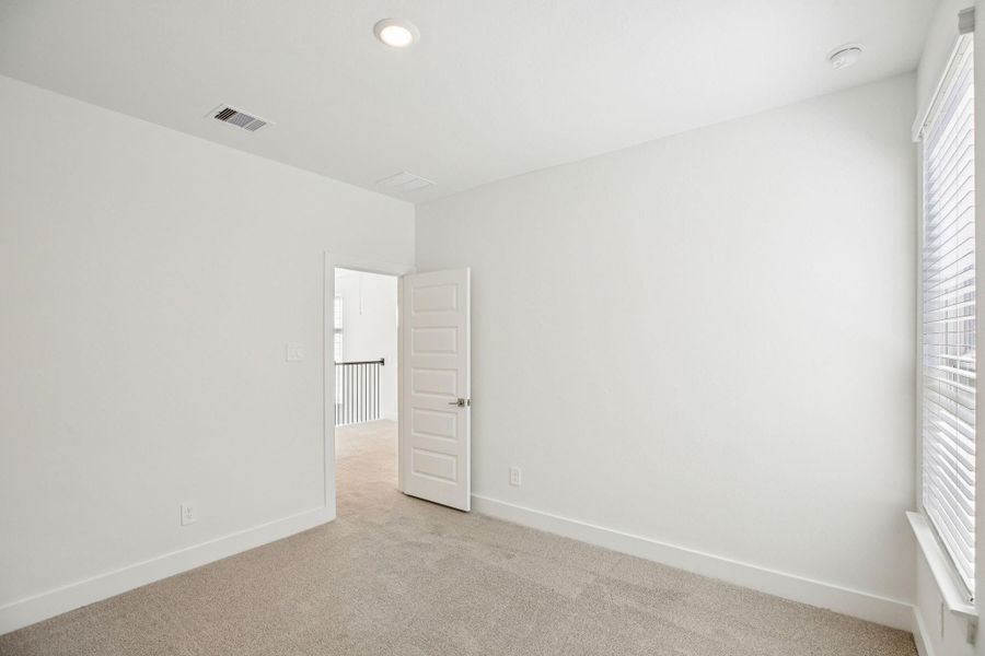 Spacious, unfurnished interior of a new home in Pinewood Trails - Luxe Series, Houston (Image 39).