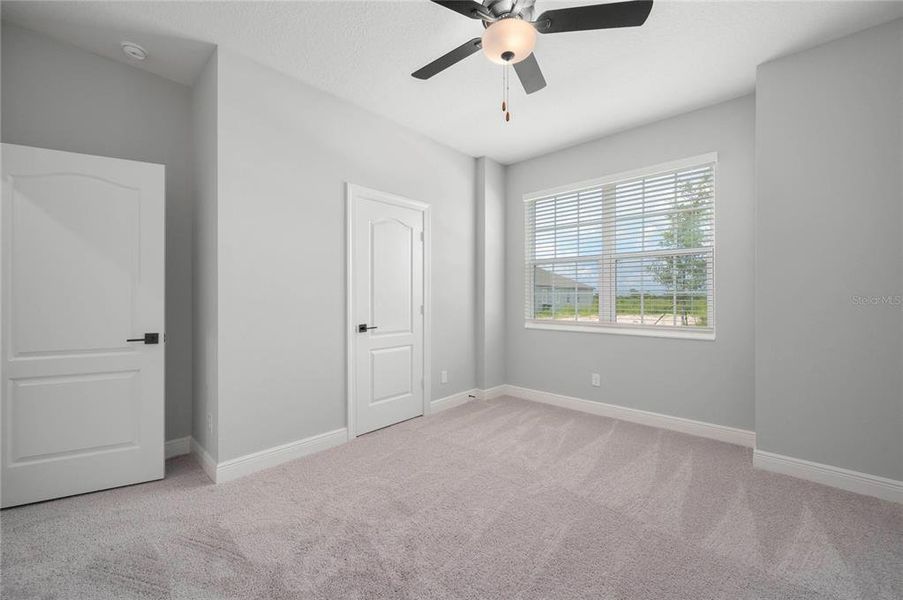 Spacious, unfurnished interior of a new home in Gum Lake Preserve, Lake Alfred (Image 22).