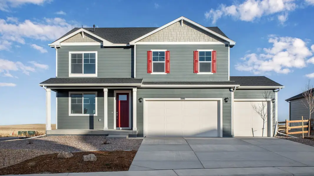 Front exterior of a new home in Lakeside Canyon, Mead, CO, highlighting curb appeal (Image 1). Front exterior of a new home in Lakeside Canyon, Mead, CO, highlighting curb appeal (Image 1).