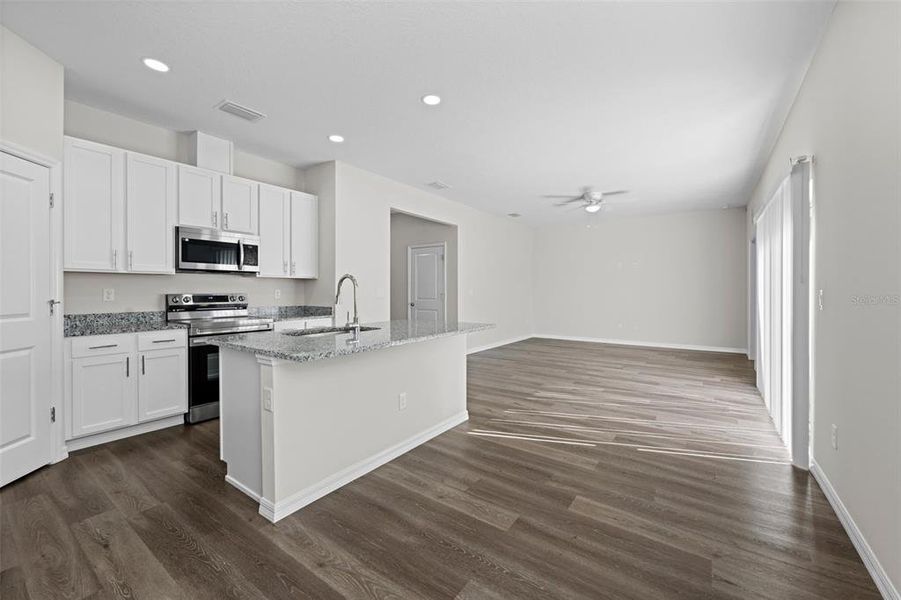 Furnished interior view inside a new home in , Weeki Wachee (Image 11).