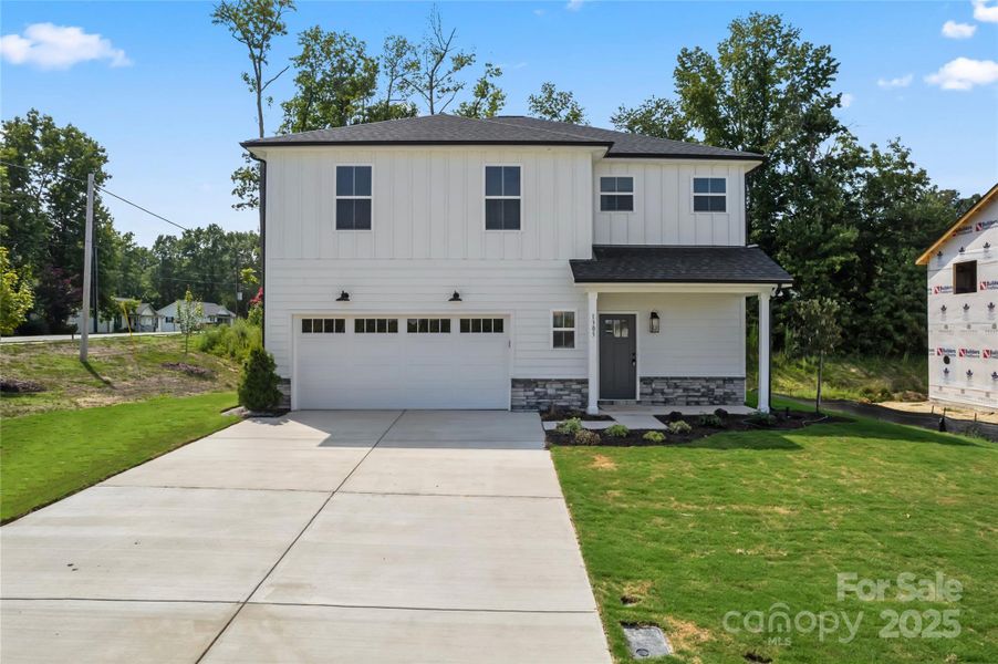 Front exterior of a new home in , Kannapolis, NC, highlighting curb appeal (Image 13).