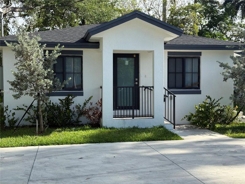 Front exterior of a new home in , Florida City, FL, highlighting curb appeal (Image 11).
