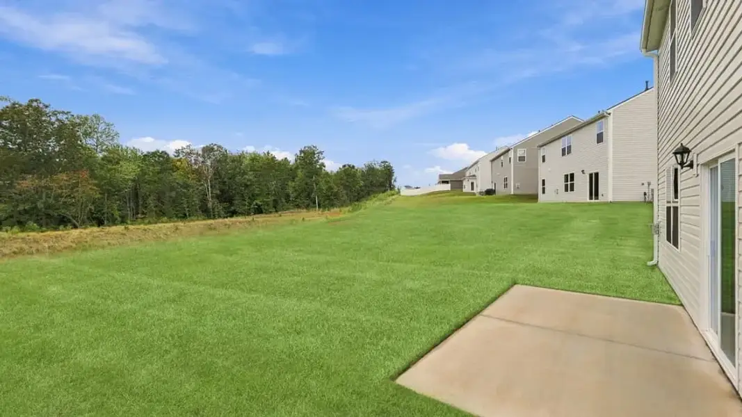 Exterior details and patio area of a home in Spring Ridge, Anderson (Image 22).