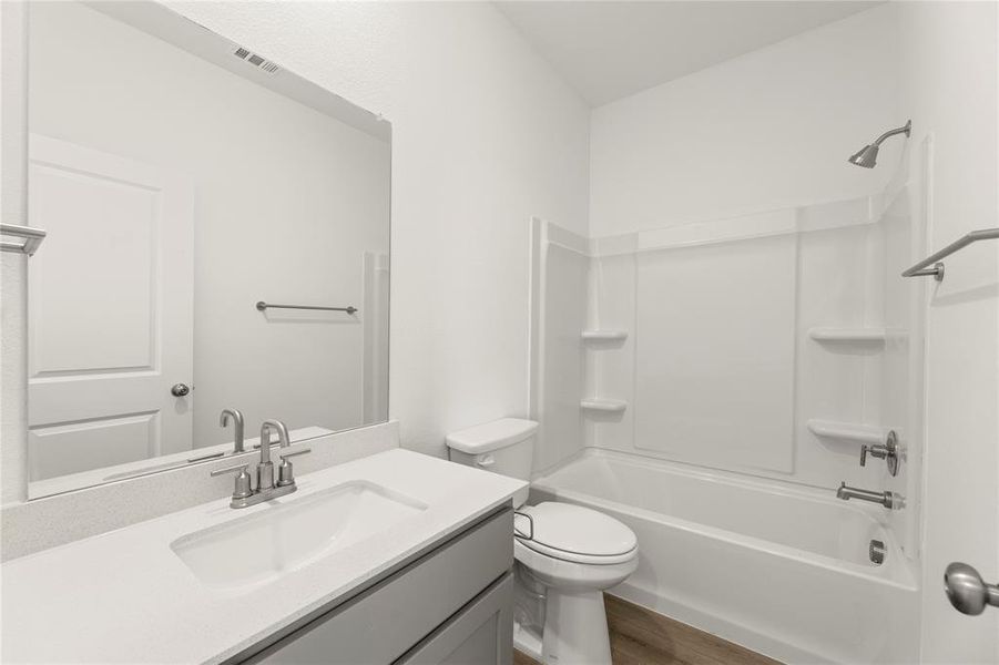 Furnished interior view inside a new home in Creekview Fossil Ridge, Pilot Point (Image 11).