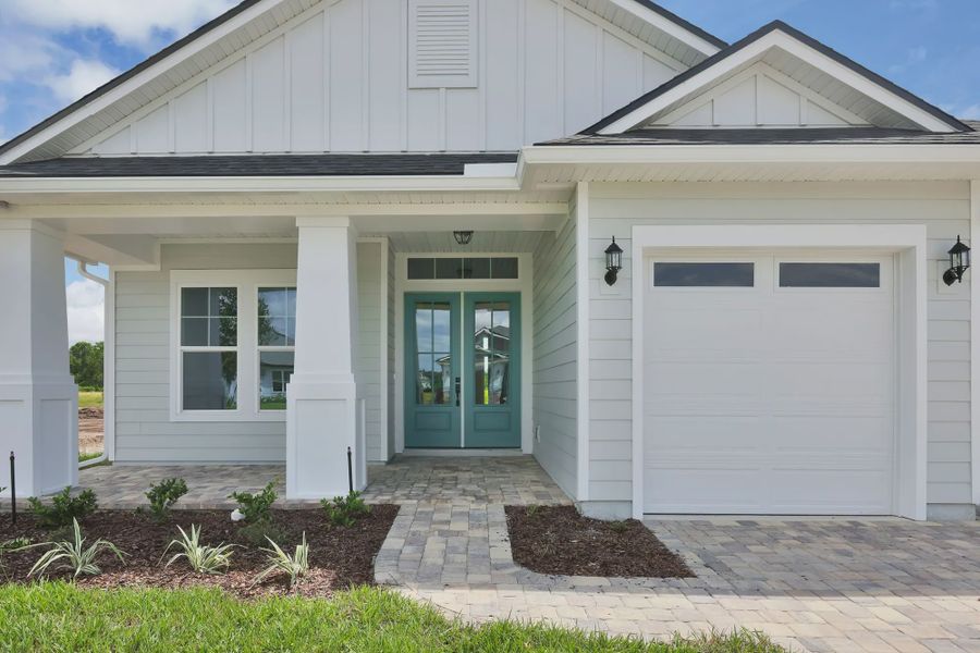 Front exterior of a home in the Amelia National Country Club community, located in Fernandina Beach, FL (Image 23).