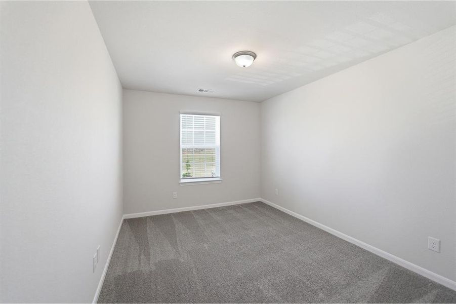 Neutral tone wall paint with a single window featuring horizontal blinds Neutral tone wall paint with a single window featuring horizontal blinds
