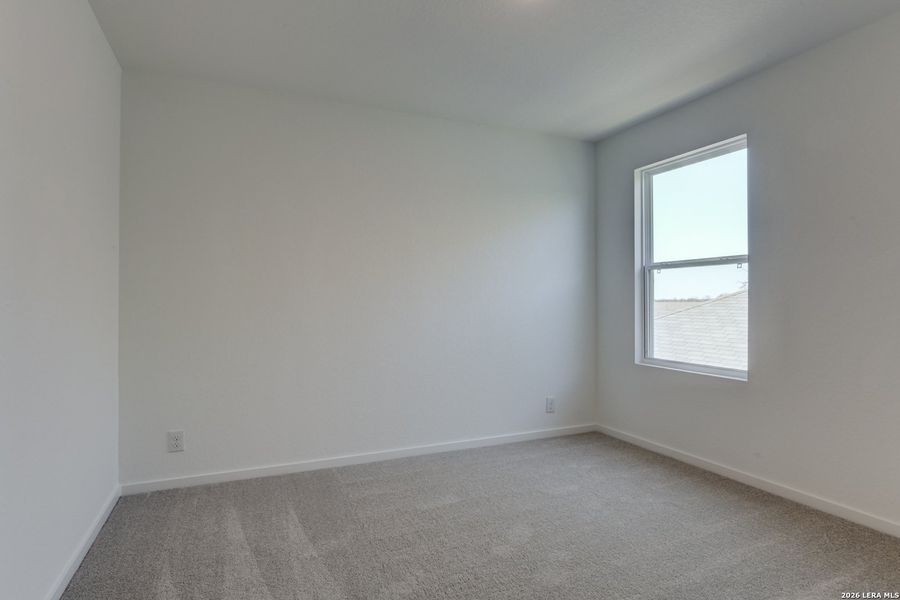 Spacious, unfurnished interior of a new home in Hennersby Hollow, San Antonio (Image 24).